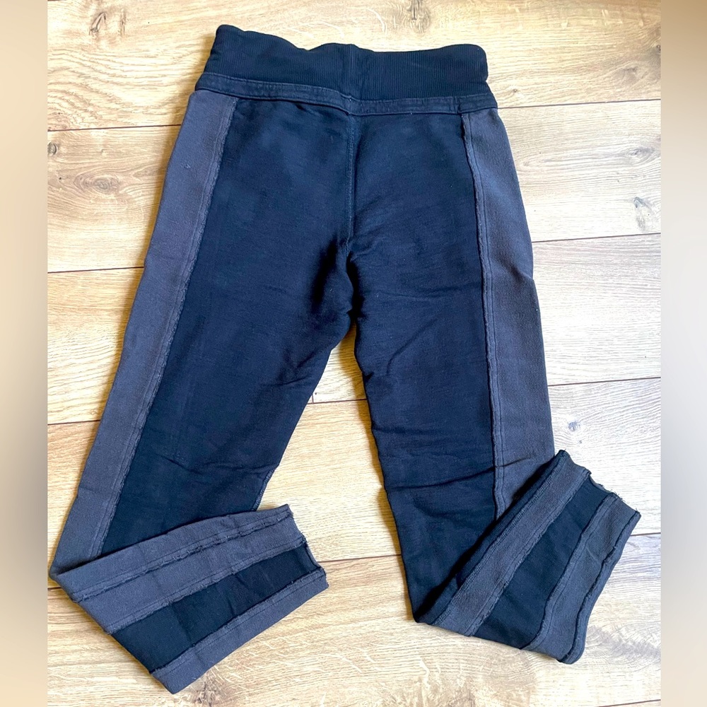 Free People Movement stretch stylish moto pants. Two tone color block. Comfort